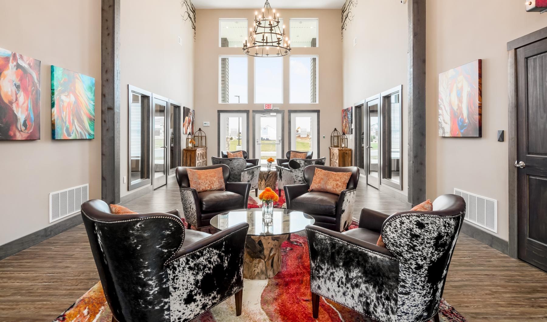 a lounge with tables and chairs